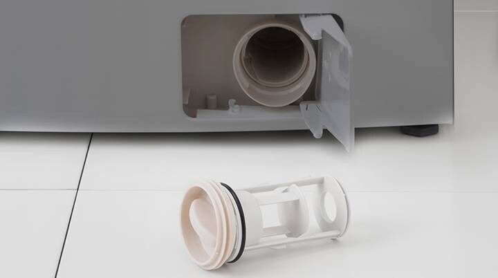 Washing machine filter on the floor